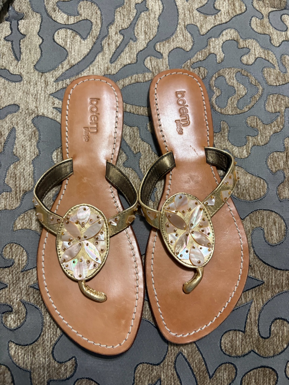 Born Gold Leather Thong Sandals with Shell Medallions